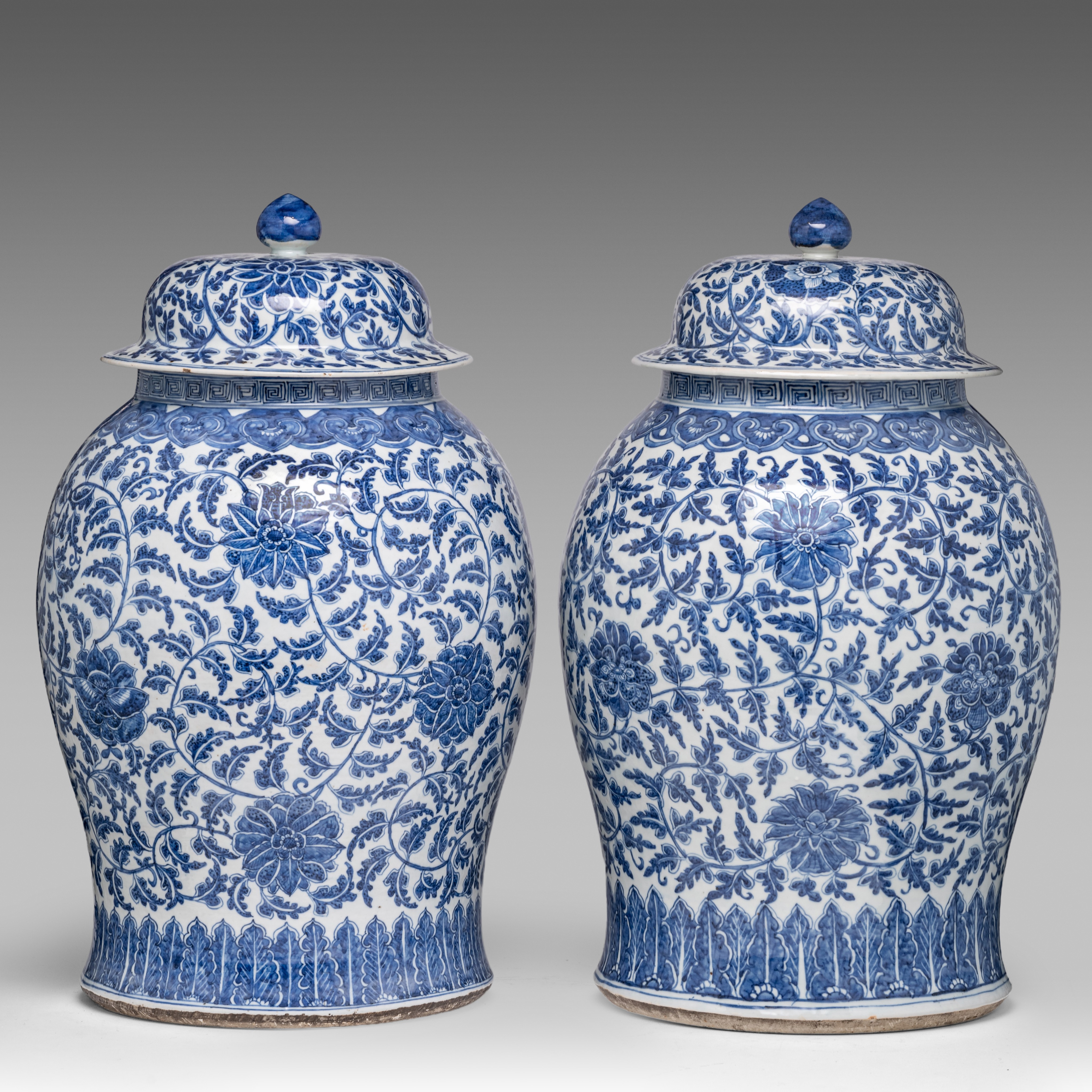 A pair of Chinese blue and white 'Scrolling Lotus' baluster vases and covers, 19thC, H 61,5 cm - Image 4 of 8