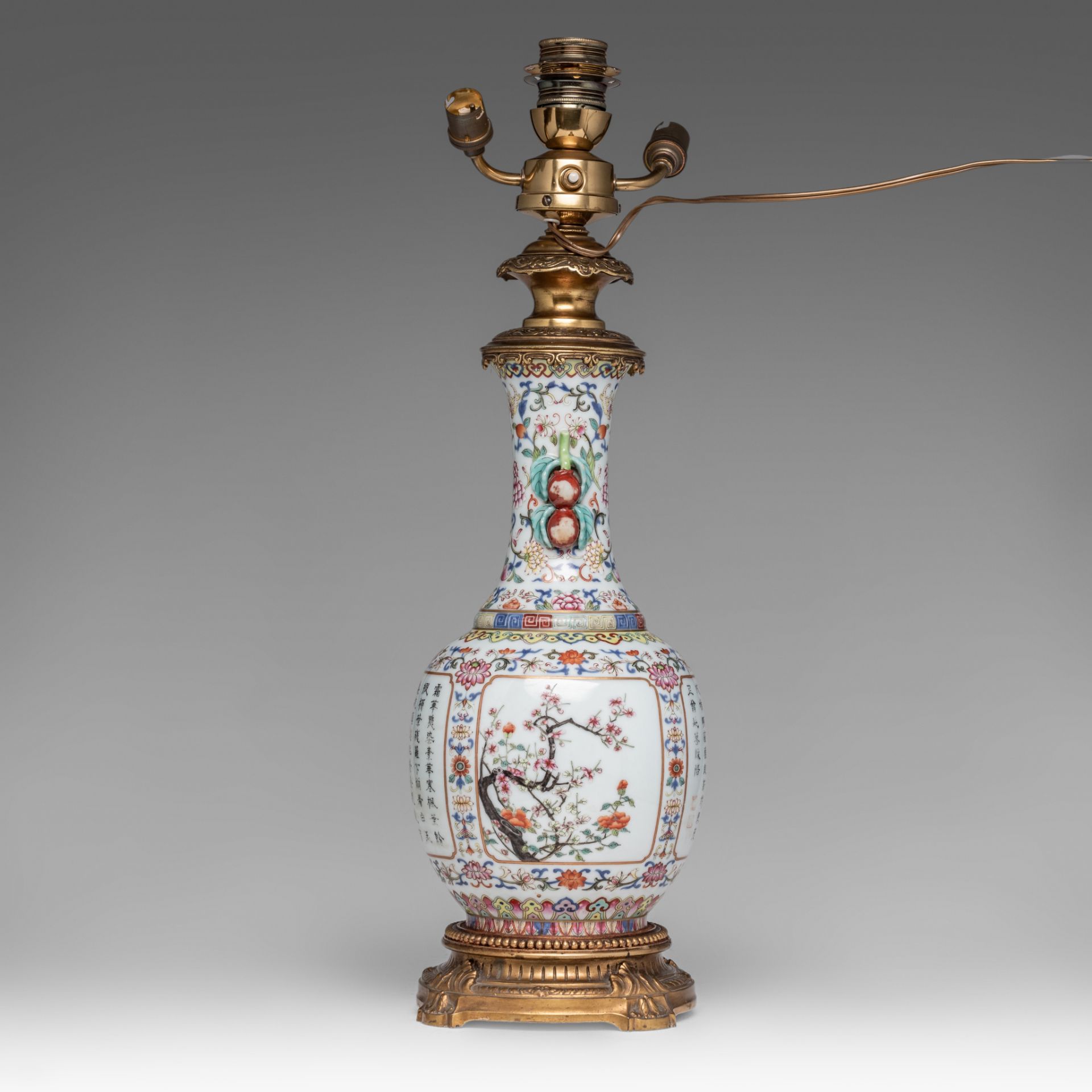 A Chinese famille rose floral decorated bottle vase, fixed with lamp mounts, with a Qianlong mark, T - Image 4 of 5