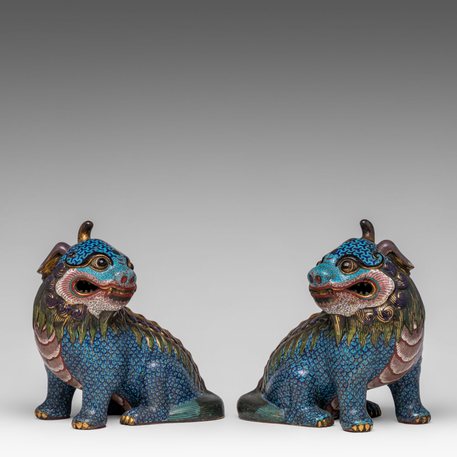 A pair of Chinese cloisonne enamelled figures of a Qilin, late Qing, L 20 - H 21 cm - Weight g