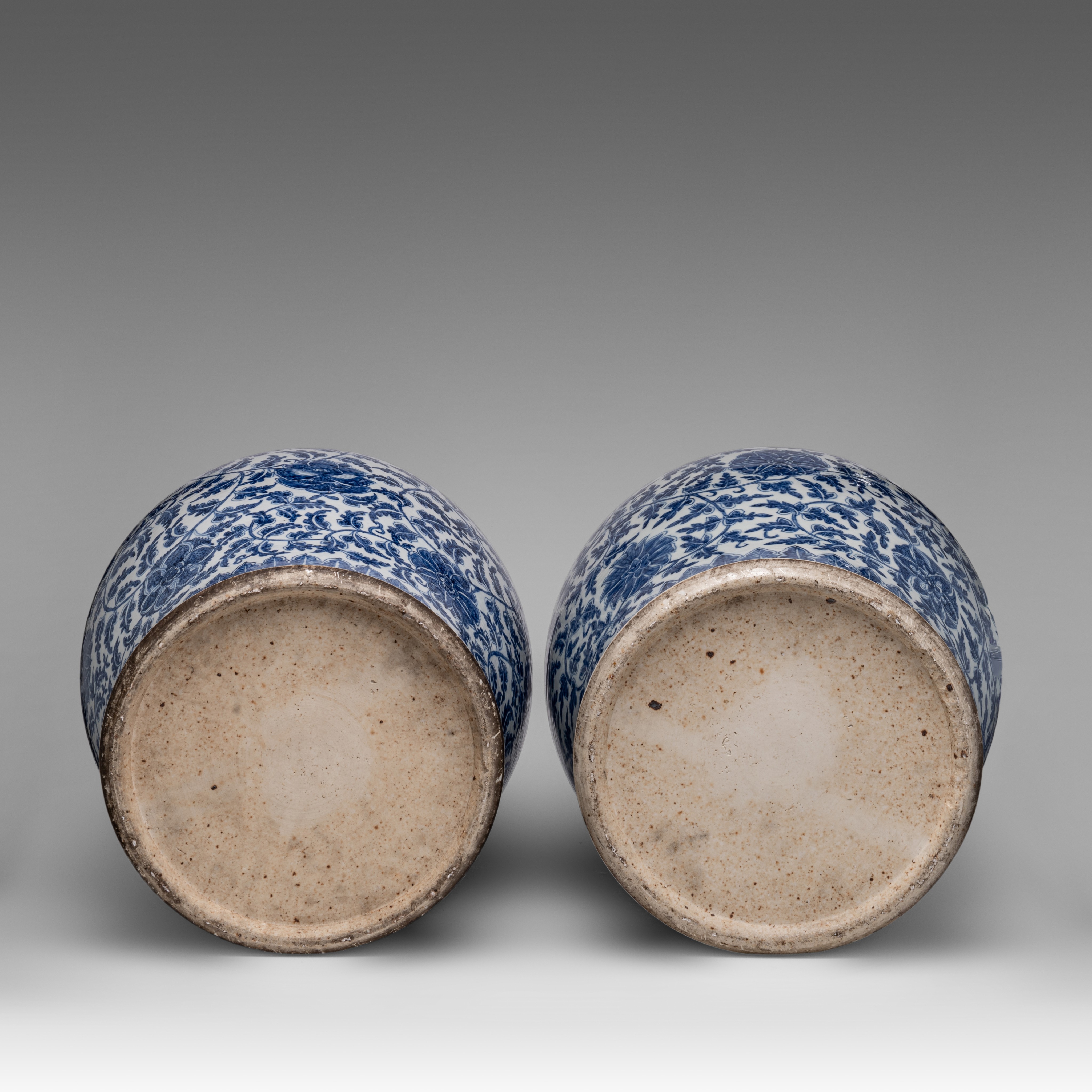 A pair of Chinese blue and white 'Scrolling Lotus' baluster vases and covers, 19thC, H 61,5 cm - Image 6 of 8