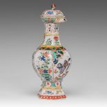 A Chinese famille verte hexagonal puzzle jug or ewer, Kangxi period, H 23,5 cm