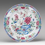 A Chinese famille rose 'Poeny garden' export porcelain charger, Yongzheng/Qianlong period, dia 38 cm