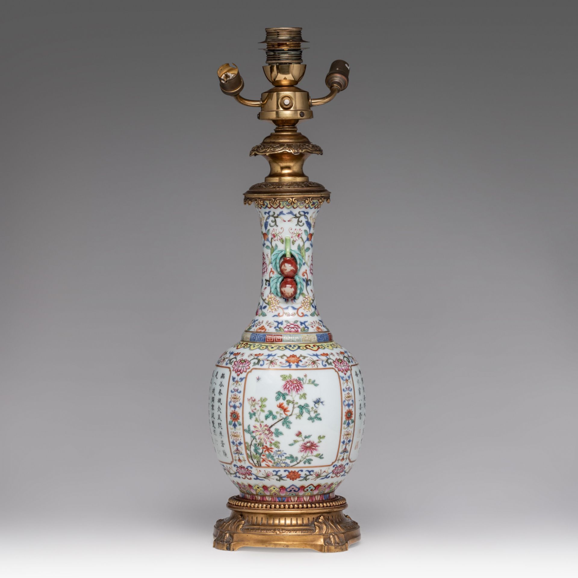 A Chinese famille rose floral decorated bottle vase, fixed with lamp mounts, with a Qianlong mark, T - Image 2 of 5