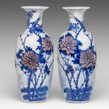 A pair of Chinese blue and white and copper-red 'Pheasant and Peony' vases, with a Kangxi mark, late