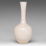 A Chinese cream-glazed bottle vase, Song-Ming dynasty, H 31 cm