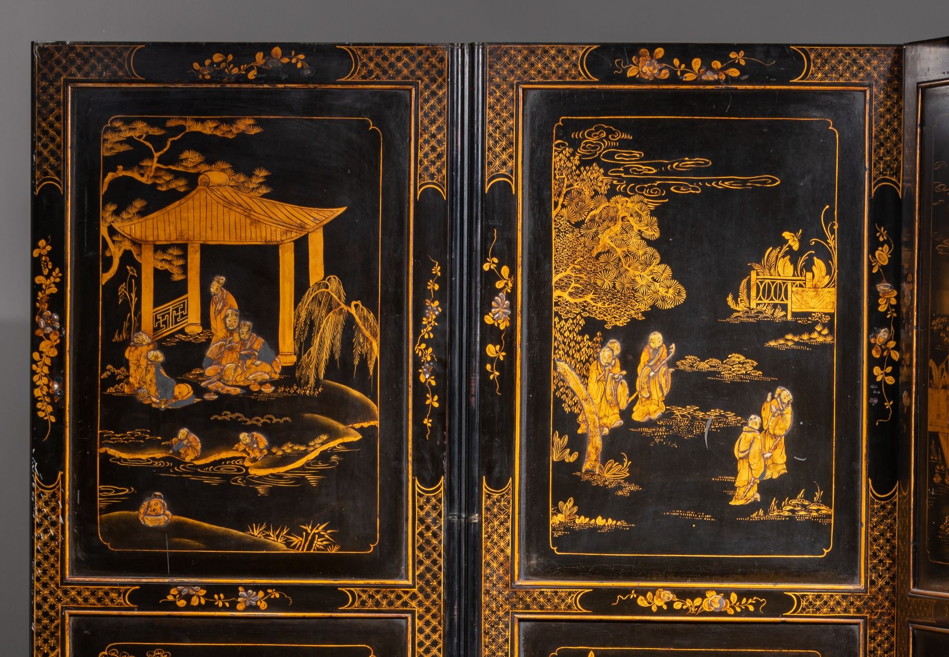 A Chinese gilt and black lacquered four-panel chamber screen, late 18thC, 60 x 198 cm (each panel) - Image 3 of 5