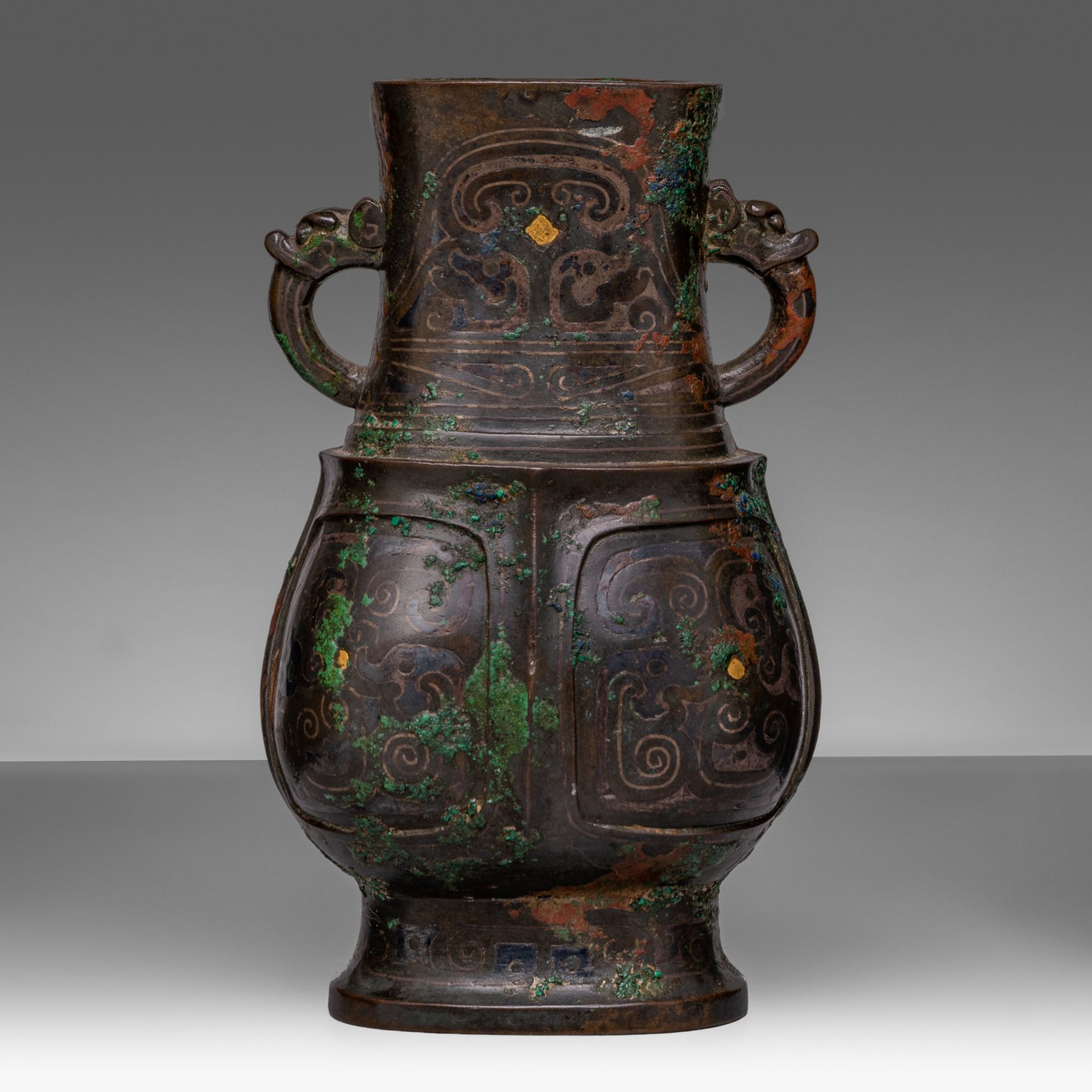 A rare and fine Chinese archaistic silver and gold inlaid bronze fanghu vase, Song - Ming dynasty, H