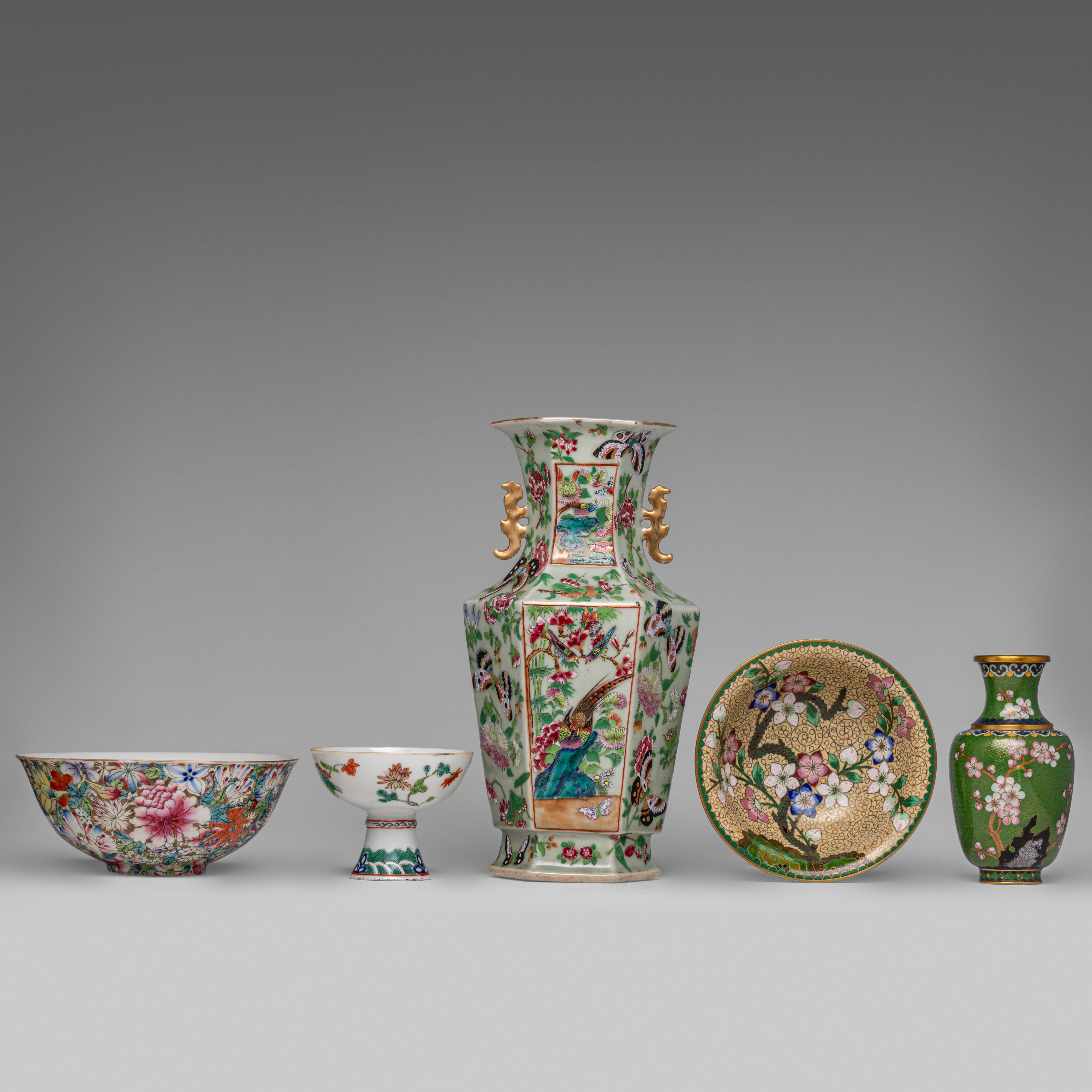 A collection of Chinese famille rose export porcelain ware and cloisonne ware, 19thC and 20thC, tall