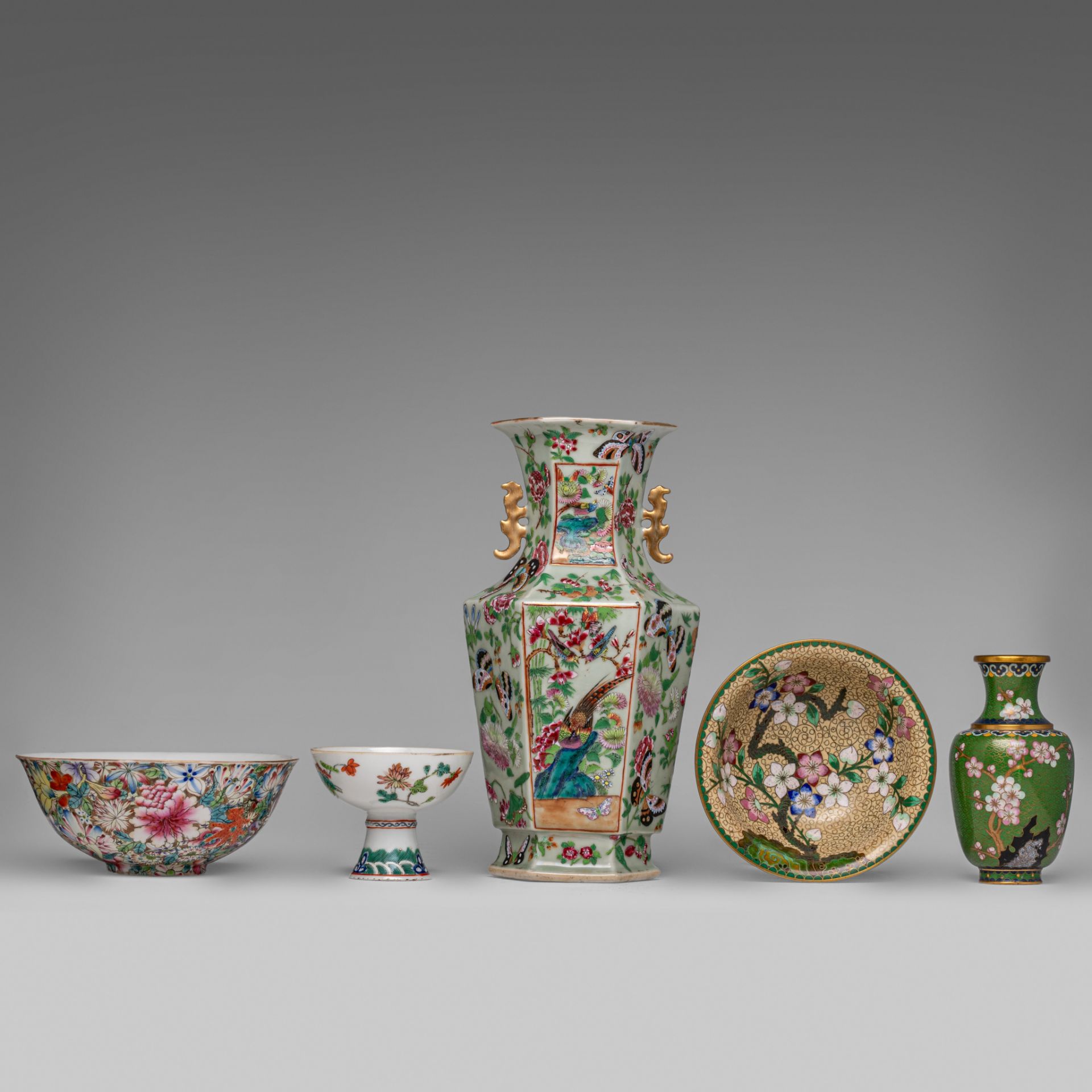 A collection of Chinese famille rose export porcelain ware and cloisonne ware, 19thC and 20thC, tall
