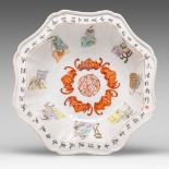 A Chinese Qianjiangcai 'Beauties and bats' flower-shaped bowl, signed text to the rim, Republic peri