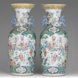 A pair of Chinese famille rose 'Festive court scene' vases, paired with lingzhi handles, 19thC, H 58
