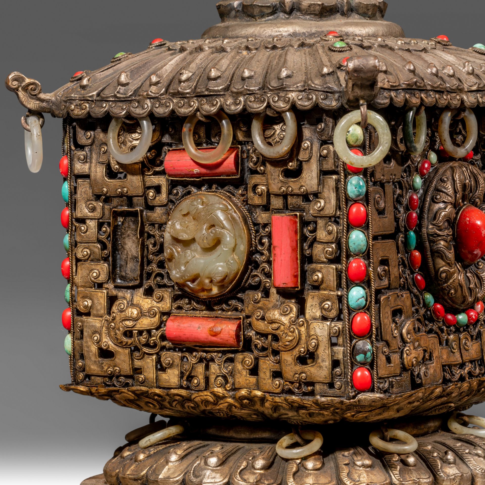 A massive Sino-Tibetan metal censer with jade carvings, coral and turquoise beads inlay, late 19thC, - Image 10 of 13