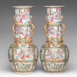 A pair of Chinese Canton famille rose bottle vases, paired with dragon handles, H 60,5 cm