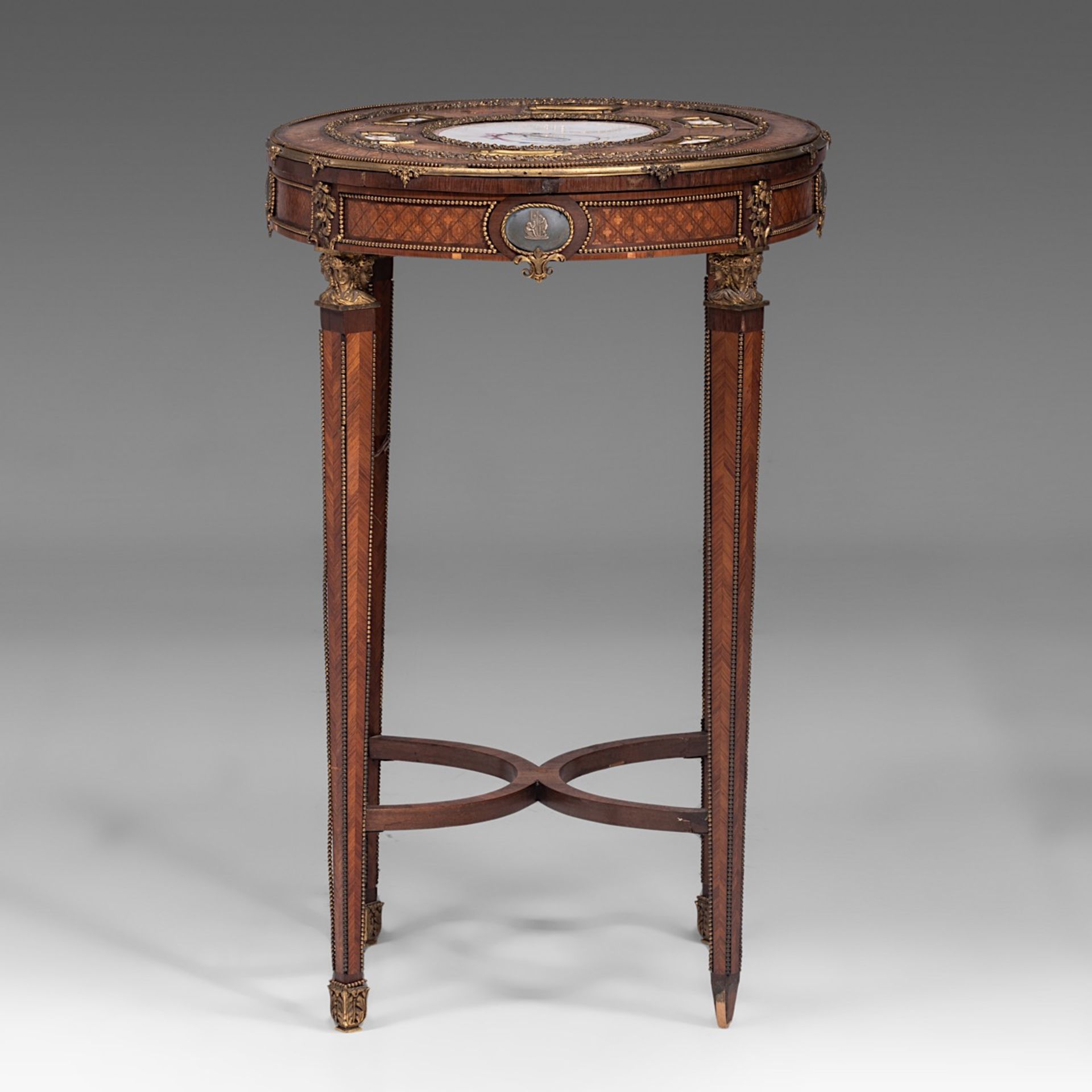 A fine Louis XVI style parquetry occasional table with Sevres porcelain plaques and gilt bronze moun - Bild 5 aus 7