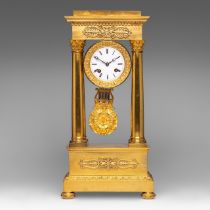 A Charles X style gilt bronze portico clock, H 49 - W 25 cm