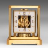 A Jaeger LeCoultre Atmos glass and brass '7 jewels' clock, H 23 - W 21 cm