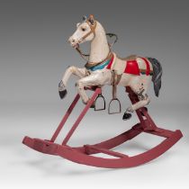 A vintage polychrome wooden rocking horse, H 102 - W 110 cm