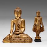 Two Burmese gilt lacquered figures of Buddha, 20thC, H 69,5 - W 18 cm / H 44 - W 17 cm
