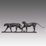 A patinated bronze Art Deco sculpture of two panthers, H 23 - W 85 cm