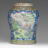 A Chinese famille rose 'Birds in flower garden' baluster vase, 19thC, H 49 cm