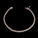 An 18ct white gold bracelet riviere set with 46 brilliant cut diamonds, weight: 14,5 g, L 19 cm, wit