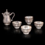 A Persian silver tea pot and six ditto bowls, H 6 - 18 cm, total weight: Ca. 1470 g