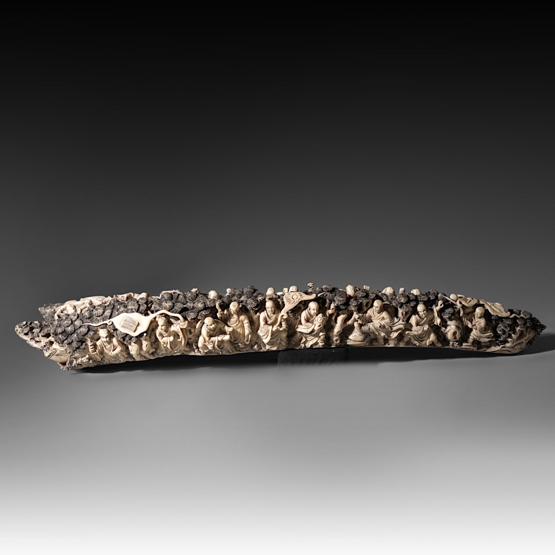 A Chinese late Qing/early Republic carved ivory tusk, on an exotic wooden base, W 85,6 cm - 5700g (+ - Image 6 of 9