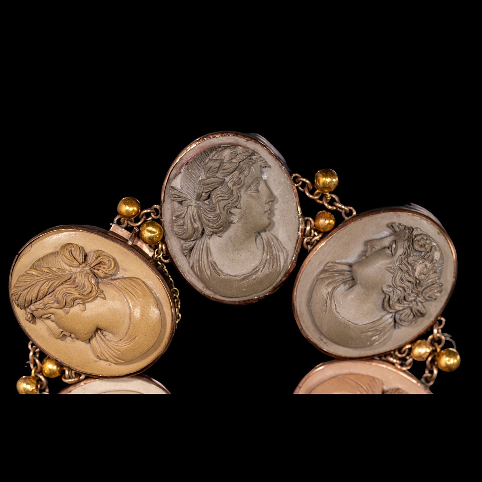 A Victorian lava cameo bracelet in gilt metal mount, L 18,5 cm, and two oval cornelian shell cameos, - Image 4 of 4