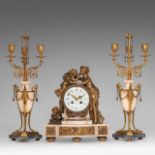 A pair of Louis XVI period candelabras and a matching Napoleon III mantle clock, H 32 - 46,5 cm