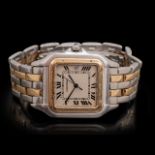 A 'Panthere de Cartier' yellow gold and stainless steel quartz movement watch