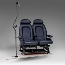 A rare pair of Concorde passenger seatings, fixed on scaled tail wing with matching reading lamp, H
