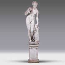 A decorative coade stone sculpture of Venus with an apple in her hand on a matching pedestal, H 230