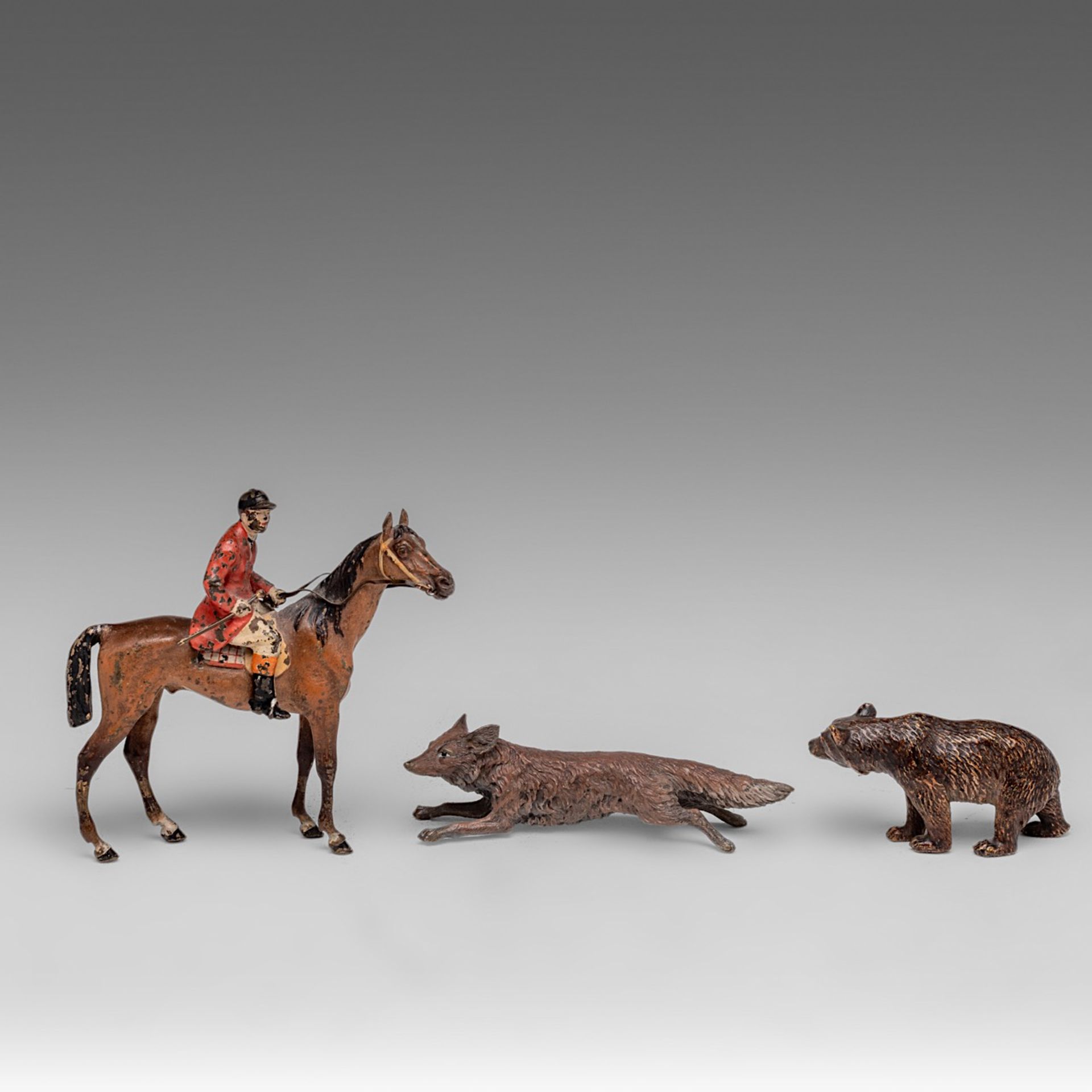 A collection of three Vienna cold-painted figures of a fox, a bear and a jockey, H 3,5 - 10,5 - W 8 - Image 2 of 5