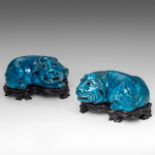 A pair of Chinese turquoise glazed ceramic figures of a recumbent water buffalo, mid-late Qing, L 20