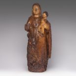 A polychrome and gilt walnut sculpture of the Madonna and Child, 16thC, H 74 cm