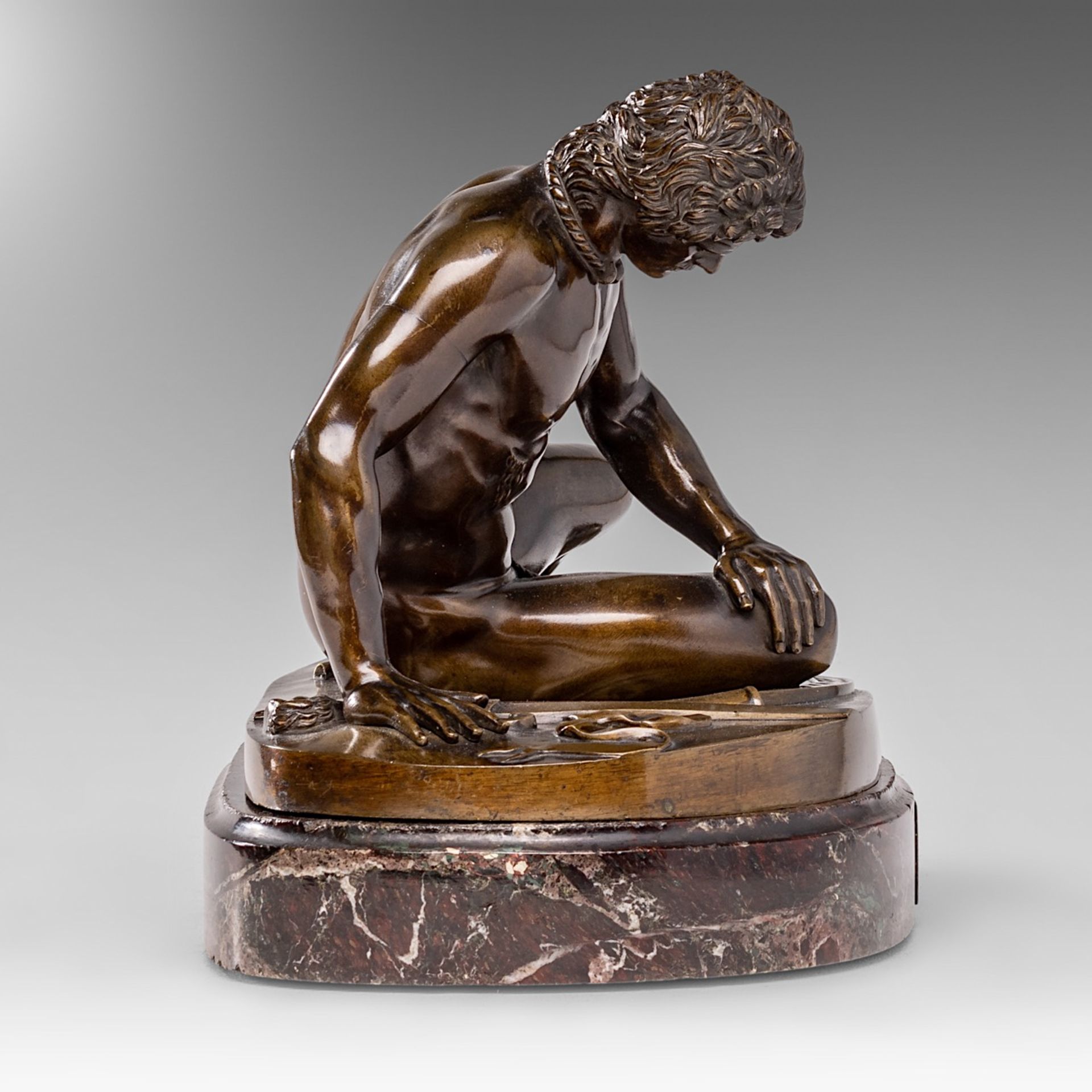 A brown patinated bronze sculpture of 'The Dying Gaul', 1871, presented on a marble base, H 22,5 - W - Image 7 of 11