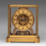 A Jaeger LeCoultre Atmos glass and brass clock, marked 'Brevets Reutter', H 23 - W 21 cm