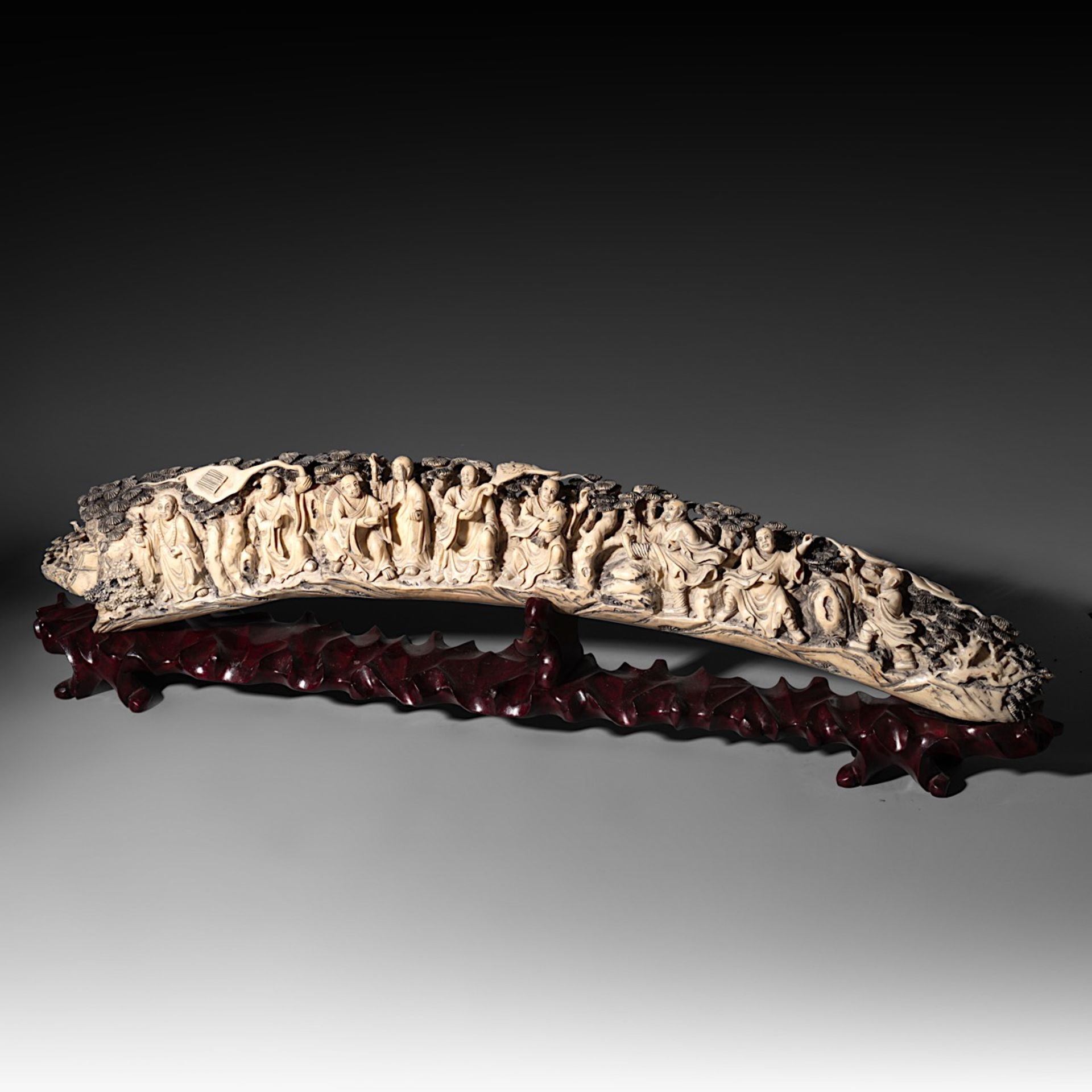 A Chinese late Qing/early Republic carved ivory tusk, on an exotic wooden base, W 85,6 cm - 5700g (+ - Image 2 of 9