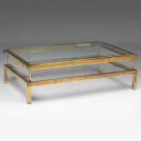 A vintage glass and brass sliding top coffee table, in the Maison Jansen manner, H 40 - W 128 - D 88