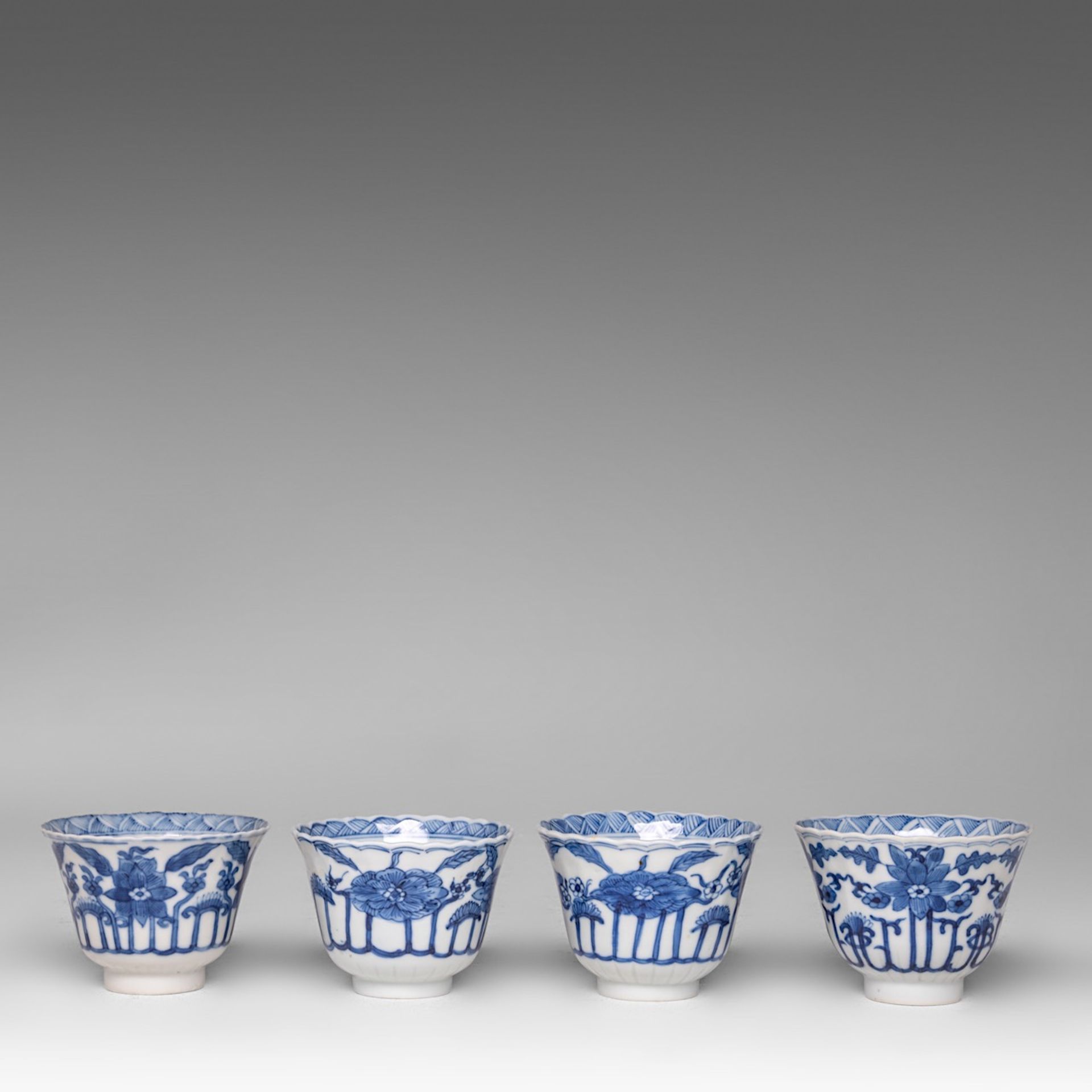 Six matching sets of Chinese blue and white floral decorated tea cups and saucers, Kangxi period, di - Image 4 of 17