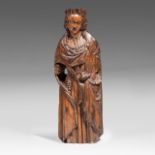 A 16thC walnut sculpture of a Saint, probably German, with traces of polychrome paint, H 80 cm