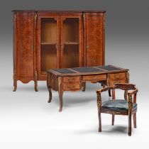 A large Rococo style library set, containing a desk, an armchair, and a cabinet