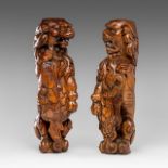 A pair of carved walnut lions, possibly former upper part of a court cupboard, 17thC, H 44 - 44,3 cm