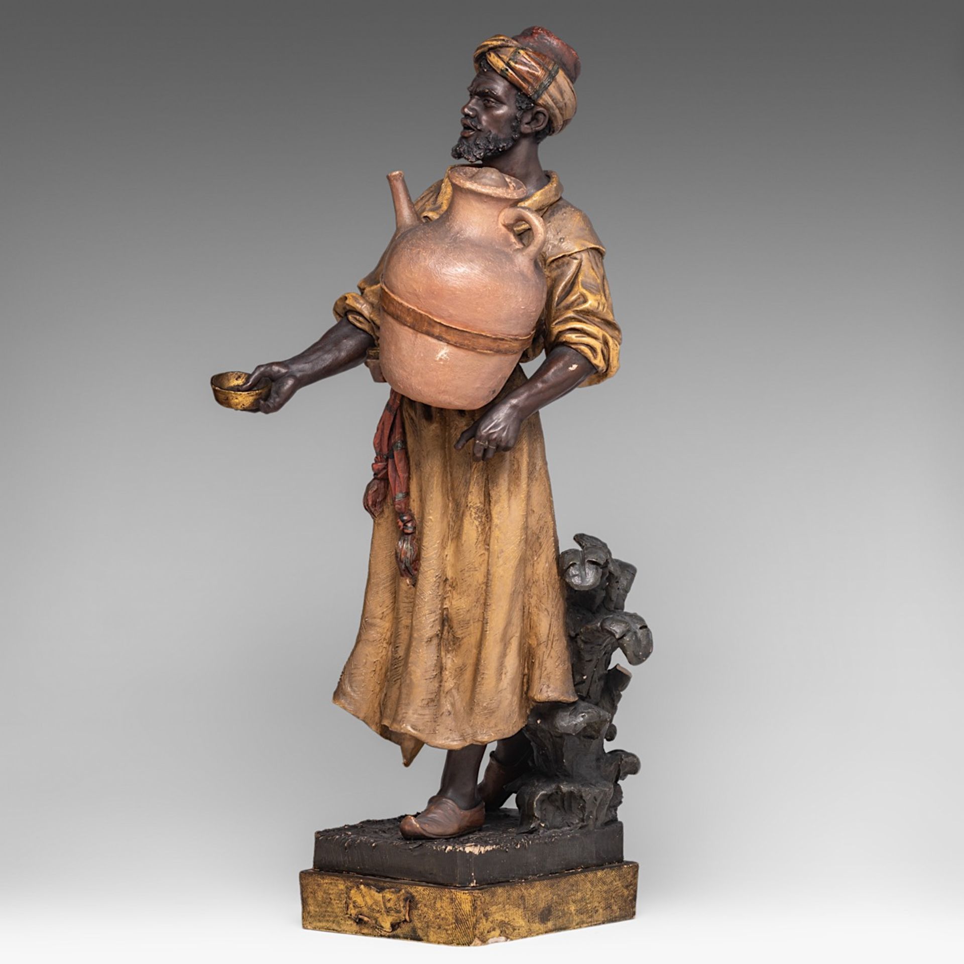 A polychrome terracotta sculpture of an Arab offering water, Goldscheider, Vienna H 65 cm - Bild 2 aus 8