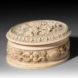 A carved ivory lady's vanity box, probably German, circa 1900, W 16,8 cm - 506g (+)
