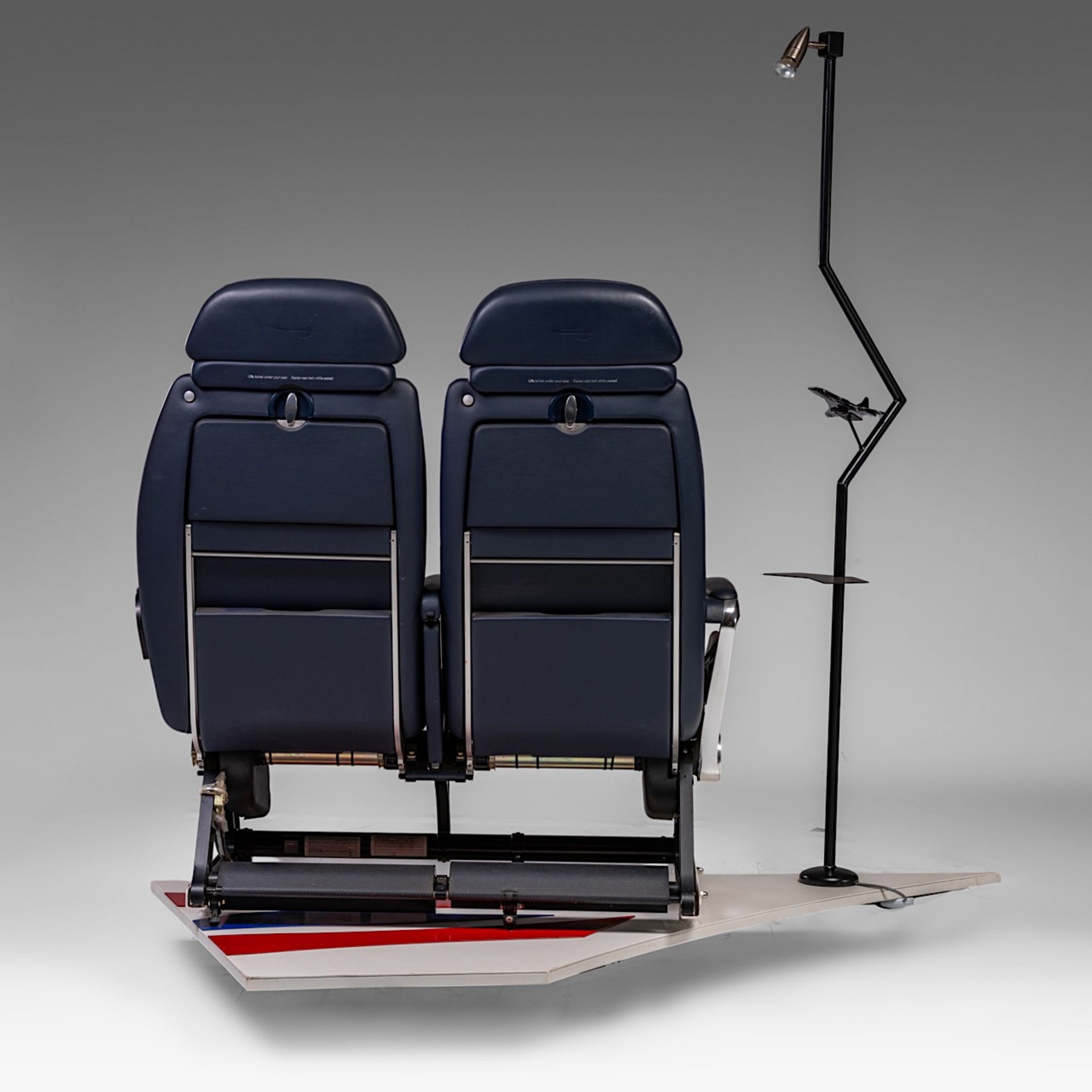 A rare pair of Concorde passenger seatings, fixed on scaled tail wing with matching reading lamp, H - Image 4 of 14