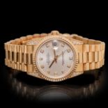 A ladies 18CT Rolex 'L'Oyster perpetual datejust' 31 yellow gold and diamonds watch