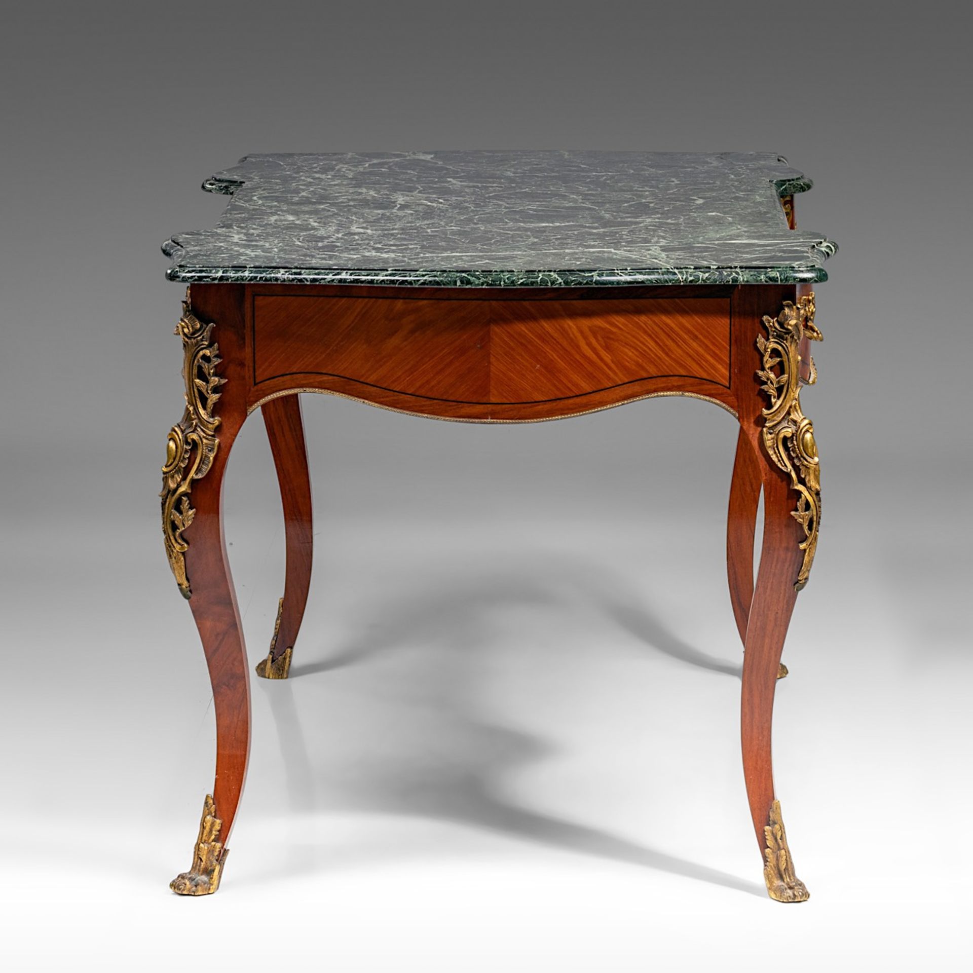 A Louis XV style 'bureau plat', with gilt bronze mounts and vert de mer marble top, H 76 - W 138 - D - Image 7 of 8