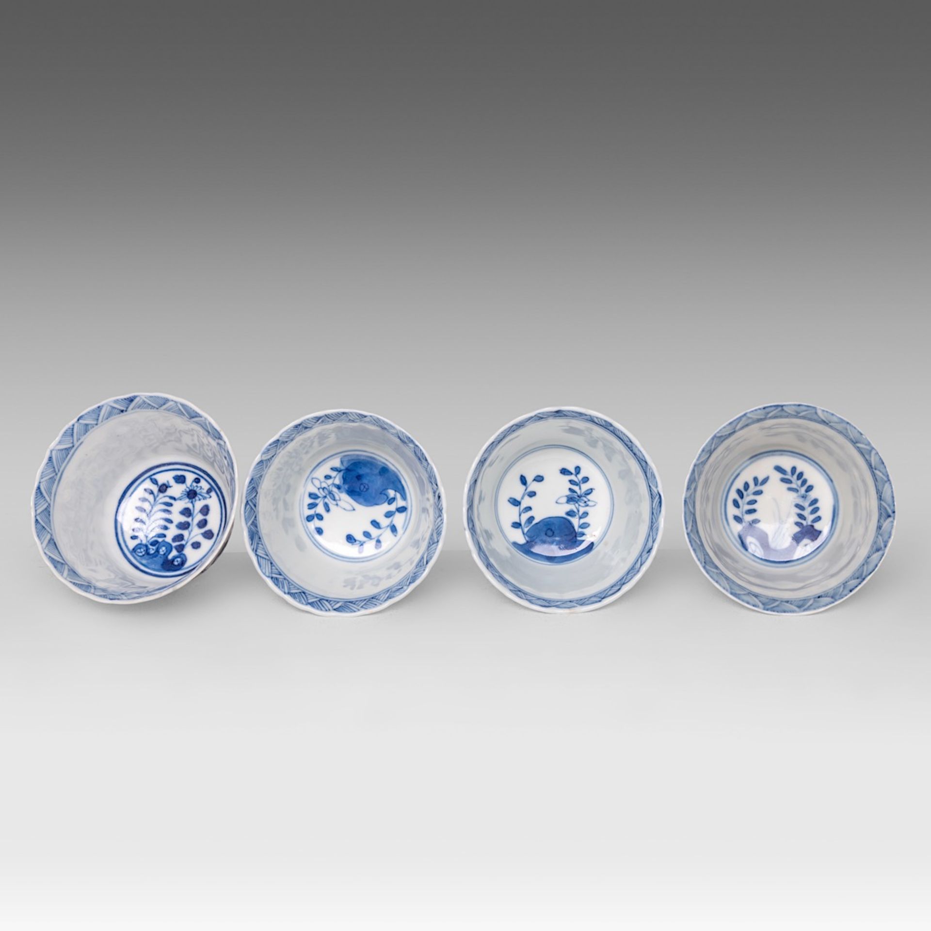 Six matching sets of Chinese blue and white floral decorated tea cups and saucers, Kangxi period, di - Image 13 of 17