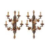 A pair of Empire style gilt and patinated bronze wall appliques, H 75 cm